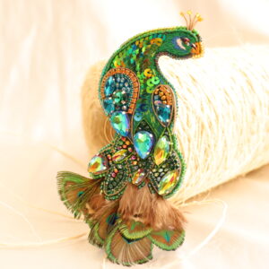 Broche pavo real